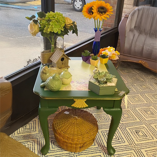 Green embellished side table